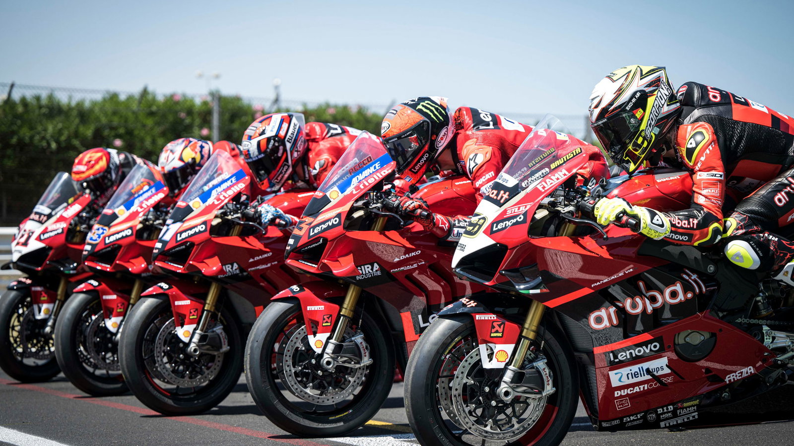 Ducati Race of Champions Panigale V4 S bikes lined up.